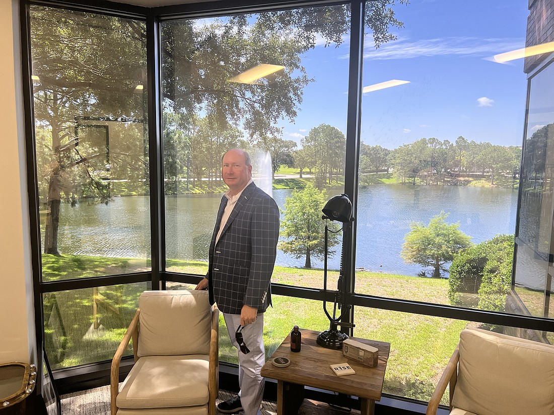 RISE: A Real Estate Company CEO Ryan Holmes in his new office at 10161 Centurion Parkway N. in Deerwood Park. RISE bought the building in 2021 and moved its headquarters to Jacksonville from Valdosta, Georgia.