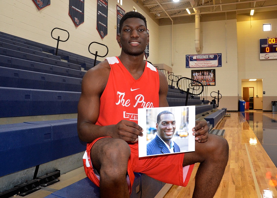 Xion Golding sits in the seat his father, Marco Golding (pictured), used to occupy during Windermere Prep home games before his passing.