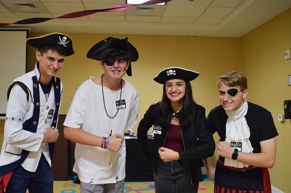 Braden River high senior JT Wright, junior Ty Moore, junior Jackie Sanchez and senior Liam Tvenstrup plan a bootcamp to bring Technology Student Association members together. (File photo)