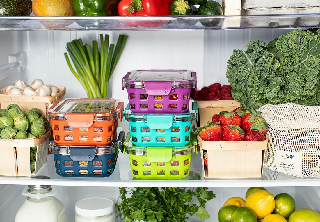 If parents prepare a base meal for the week in advance, they can throw in different sides each day to add variety, like carrots and celery stick with hummus, a container of yogurt, or strawberries. (Photo via Ello)