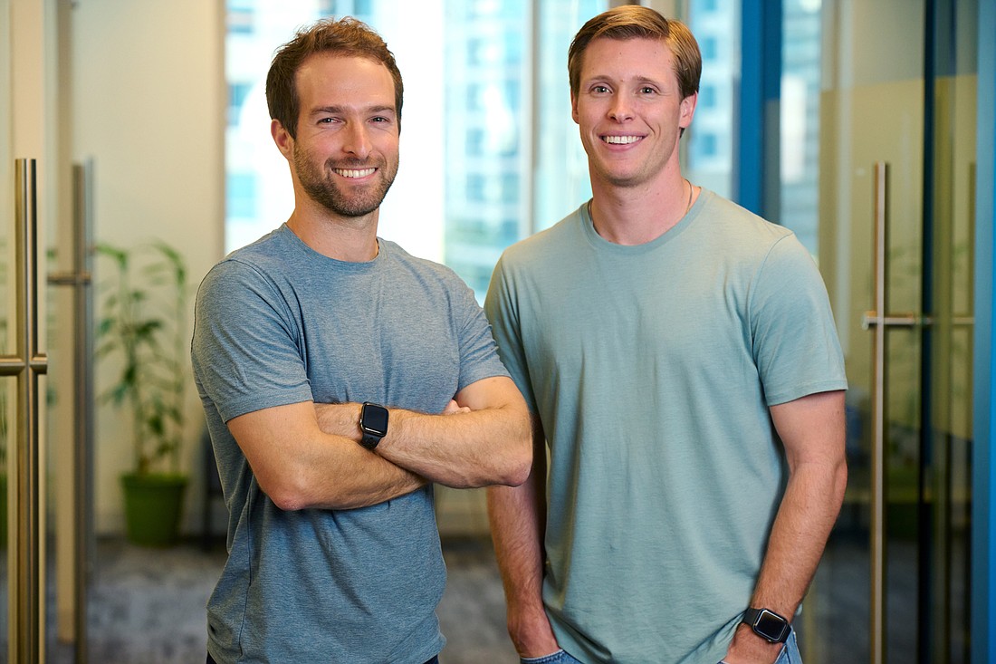 Jake Rothstein and Peter Badgley co-founded UpsideHÅM, a Fort Lauderdale company that helps older people find a place to live and gets them the services they need.  (Courtesy photo)