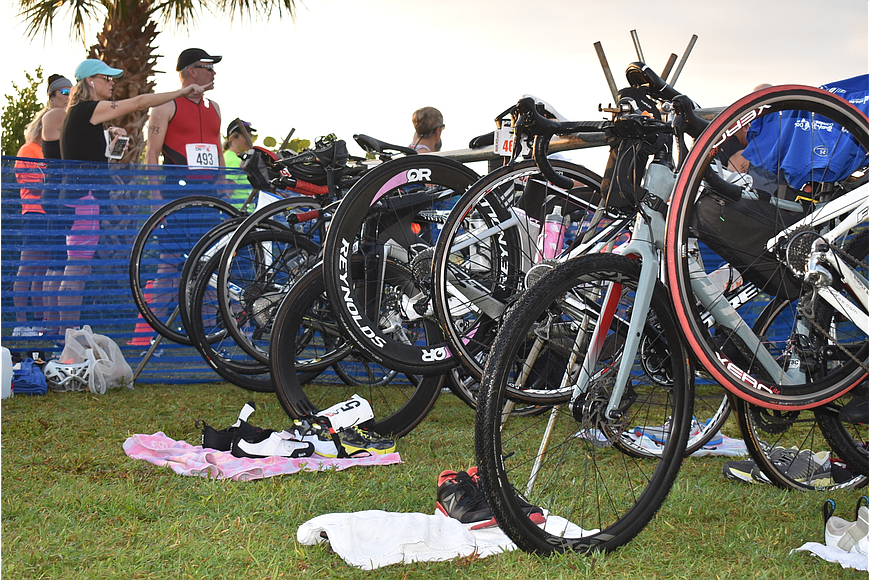 Bicycles stand ready for the Longboat Key Triathlon in December 2019. (File photo)