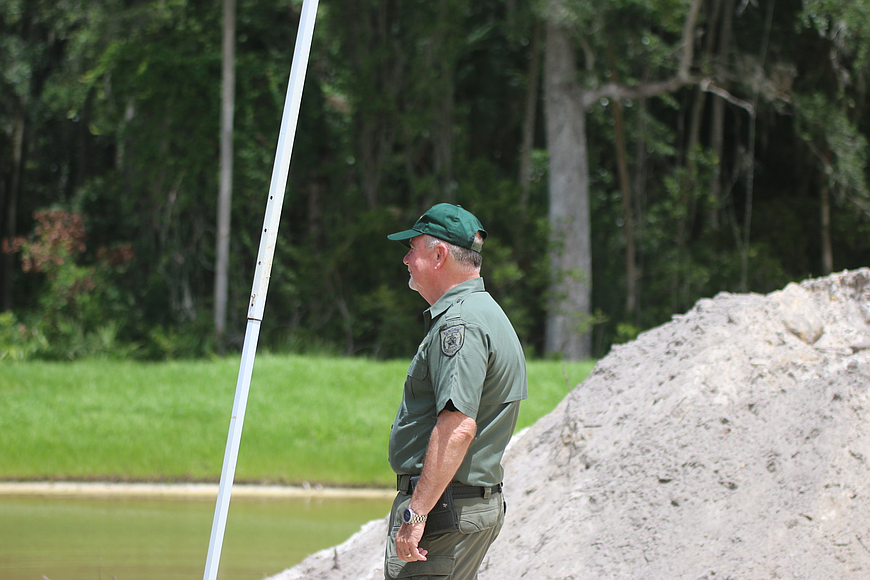 Sheriff Rick Staly surveys the operation. File photo by Brent Woronoff