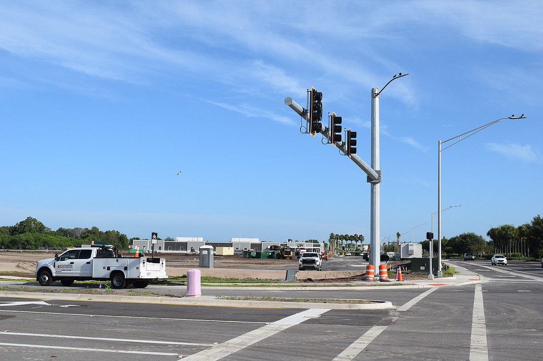 With the Lakewood Ranch Prep Academy in the background, a new set of signal lights is set to go operational at White Eagle Boulevard and Crossland Trail. (Photo by Jay Heater)