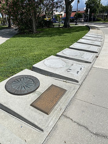 The plaques are being slowly taken out, cleaned and returned. (Photo by Harry Sayer)