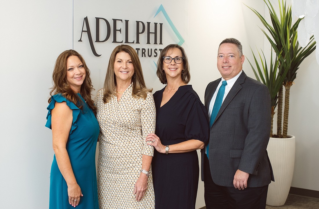 Adelphi Trust&#39;s leadership team: Julie Johnson, COO; Katie Pemble, co-founder and CEO; Gentry Barnett Byrnes, co-founder and chief fiduciary officer; and Alan Stegeman, chief compliance officer. (Courtesy photo)