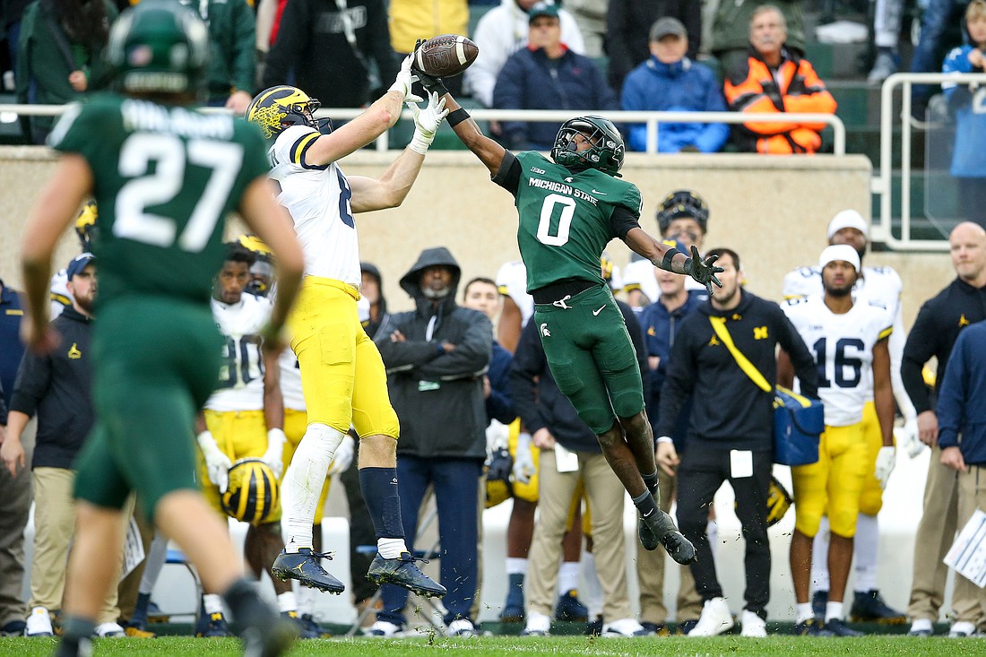 Charles Brantley (0) intercepts a pass against Michigan. The former Riverview defensive back is a big part of the Spartan&#39;s defensive plan. (Photo courtesy of Michigan State Athletics)