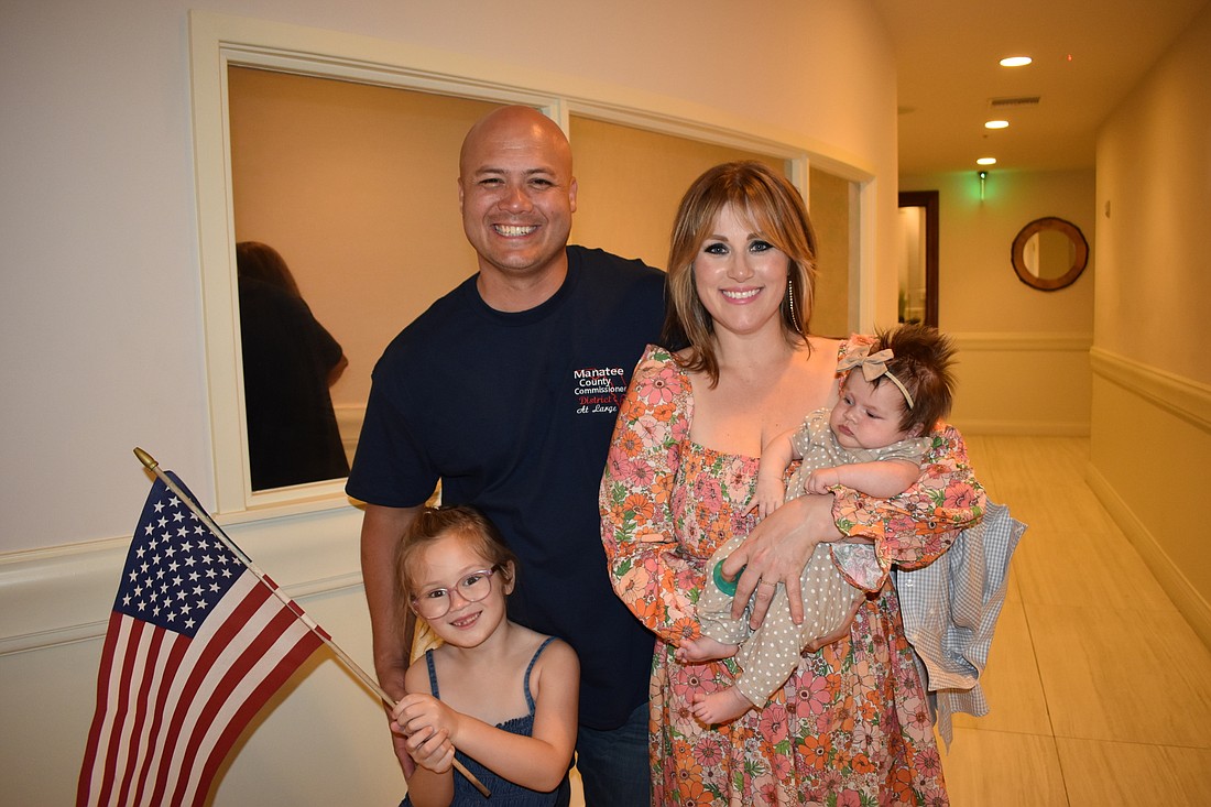 Jason Bearden, his 6-year-old daughter, Tessa; his wife, Katie; and his 8-week-old daughter, Allie, celebrated on election night. (Photo by Ian Swaby)