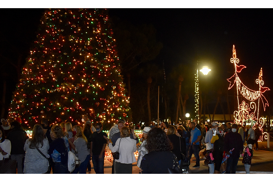 The decorated tree in the center of St. Armands Circle has for years been the focus of the shopping district during the holidays. (File photo)