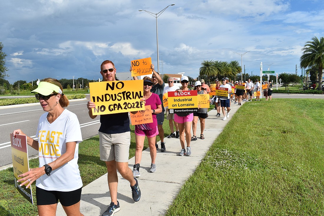 Numerous residents turned out to protest the possible rezoning of a stretch of Lorraine Road between University Parkway and Fruitville Road to allow light industrial and office uses. (Photo by Ian Swaby)