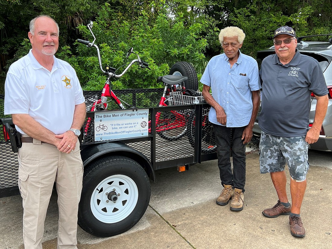 From left to right: Flagler County Sheriff Rick Staly, Frank Diaz, and Joe Golan of the Bike Men of Flagler County. Photo courtesy of the FCSO