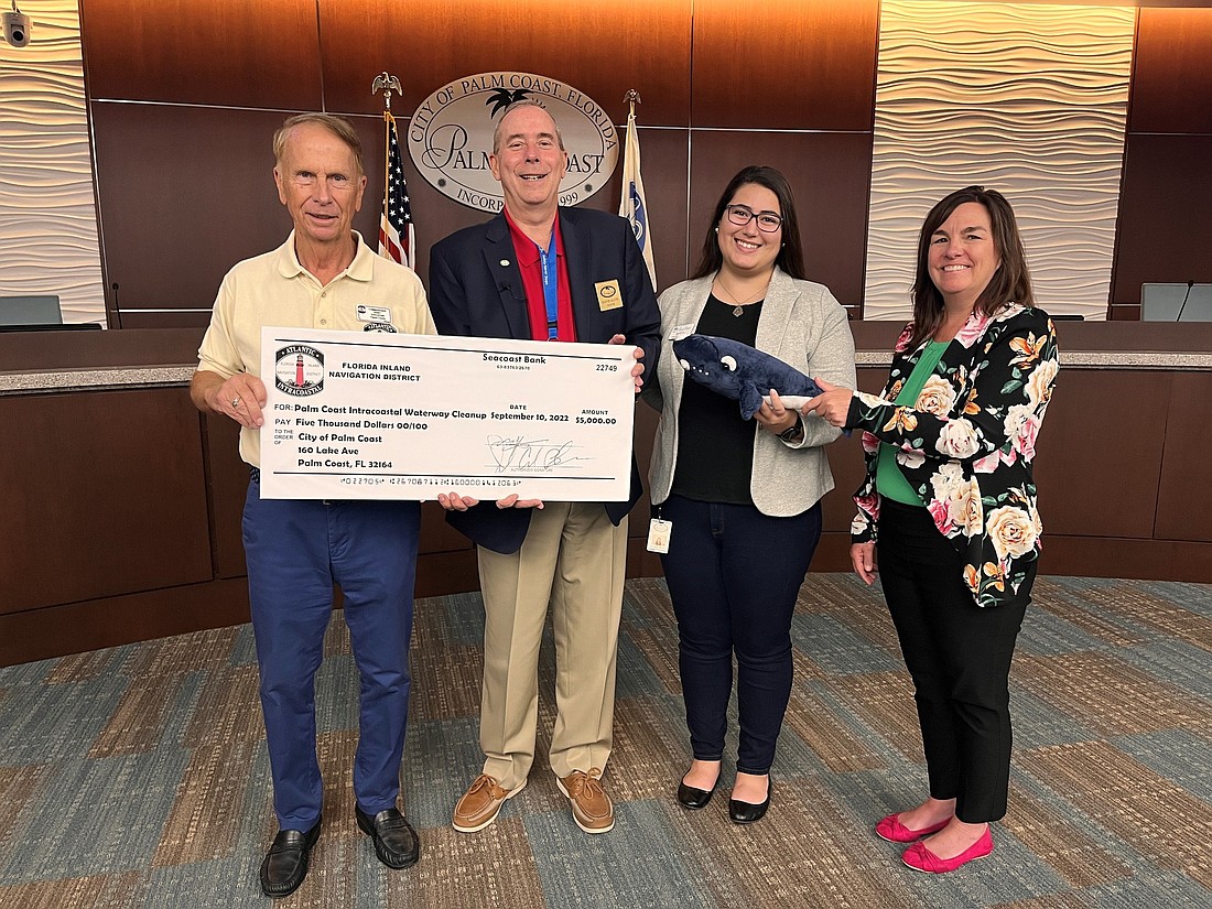 From left to right: FIND Commissioner Randy Stapleford, Palm Coast Mayor David Alfin, Palm Coast Environmental Planner Jordan Myers, Palm Coast City Manager Denise Bevan. Courtesy photo