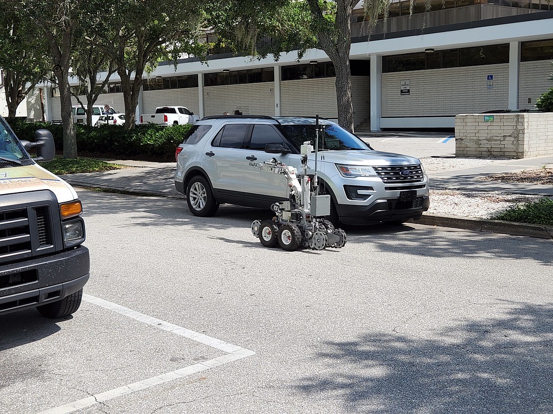 A police robot heads toward Sarasota City Hall on Tuesday. (Photo by Andrew Warfield)