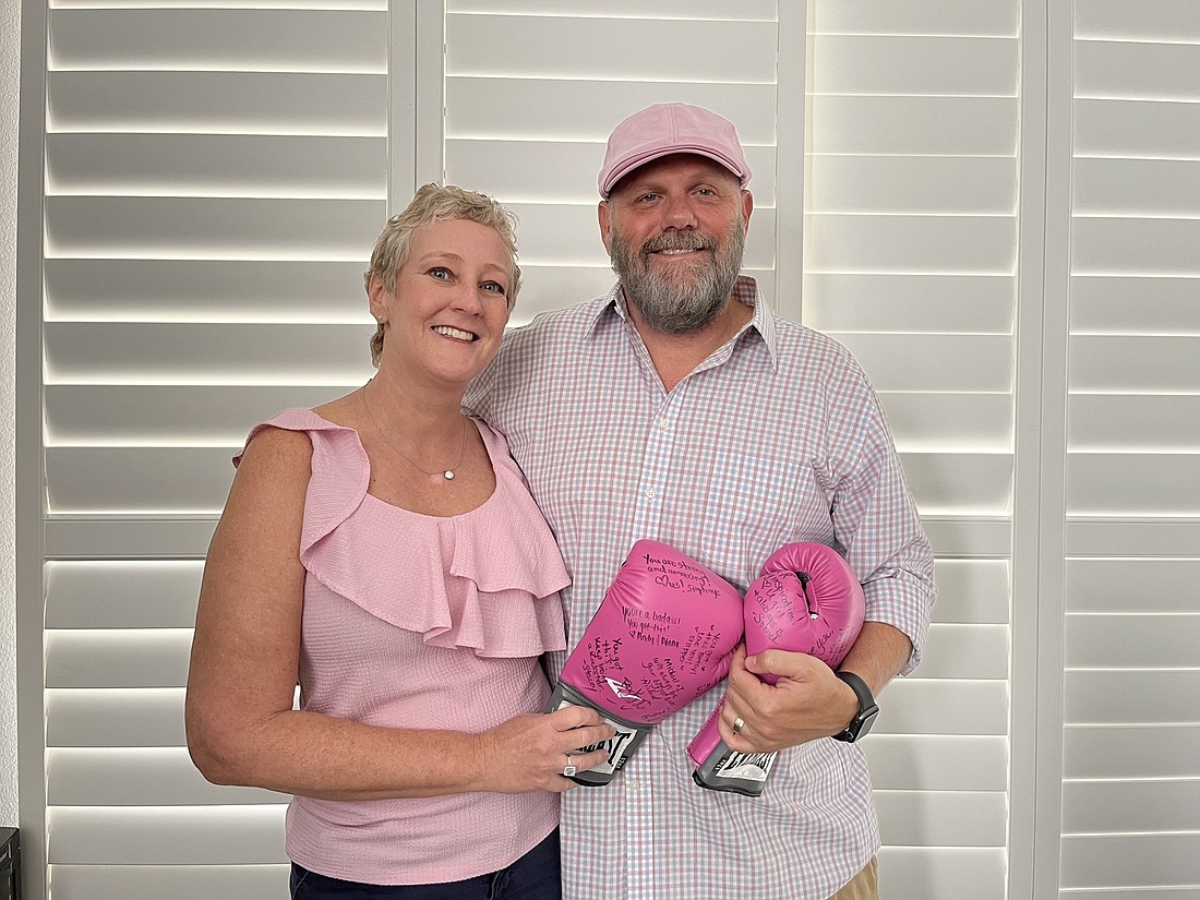 Summerfield&#39;s Betsy Young and her husband, Jeff Young, can&#39;t wait for the Real Men Wear Pink Fashion Show where Jeff Young will walk the runway. (Photo by Liz Ramos)