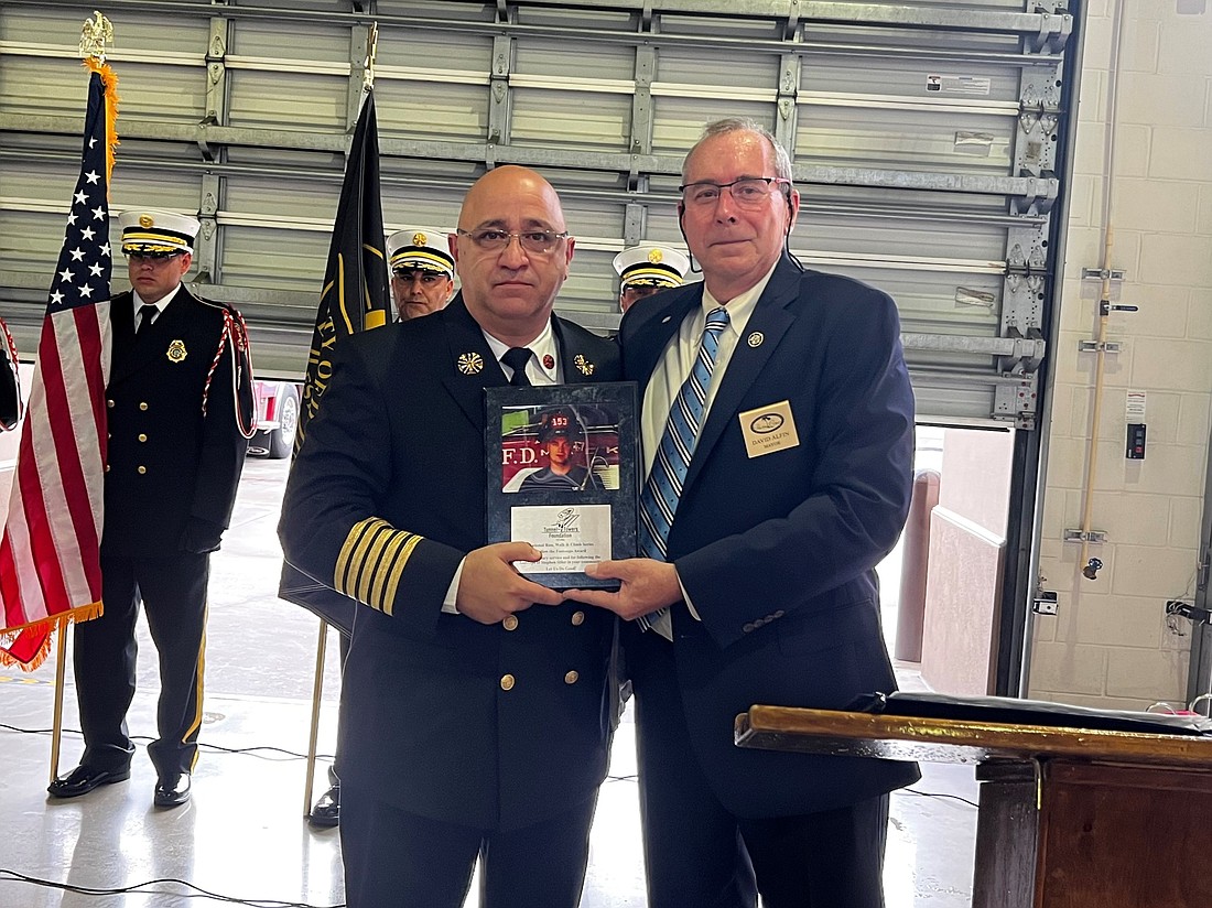 Fire Chief Jerry Forte presented award by Mayor David Alfin. Courtesy photo