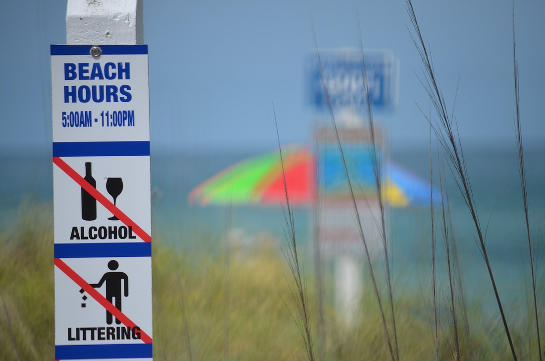 Planning, Zoning and Building Director Allen Parsons said it would be relatively easy to add smoking to signs already indicating appropriate beach behaviors. (Photo by Eric Garwood)