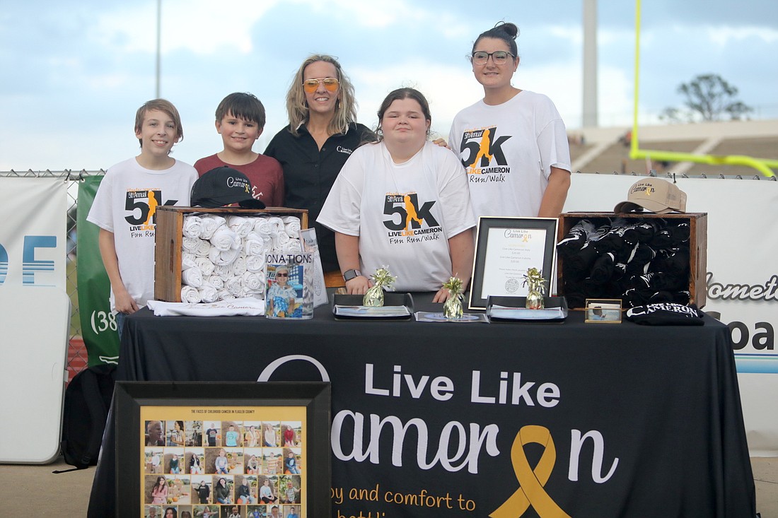 Jackson, Zac, Melissa Fulling, Jessie and Toni at the Live Like Cameron table at the Flagler Palm Coast football game on Sept. 23.