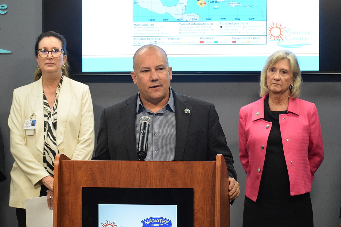 Cynthia Saunders, the superintendent of the School District of Manatee County, and commissioners Kevin Van Ostenbridge and Vanessa Baugh urge residents to prepare for Hurricane Ian. (Photo by Liz Ramos)