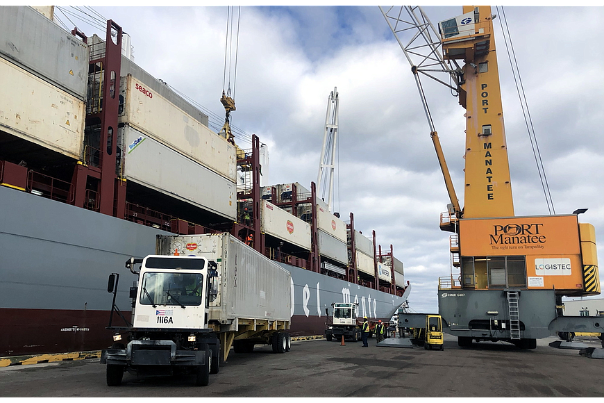 Containers filled with fresh fruits are offloaded at SeaPort Manatee from the Del Monte Spirit, an energy efficient containership fleet.