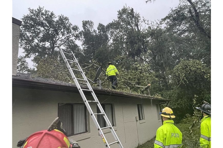 Palm Coast Fire Department crews survey damage from the storm. Photo courtesy of the Palm Coast Fire Department
