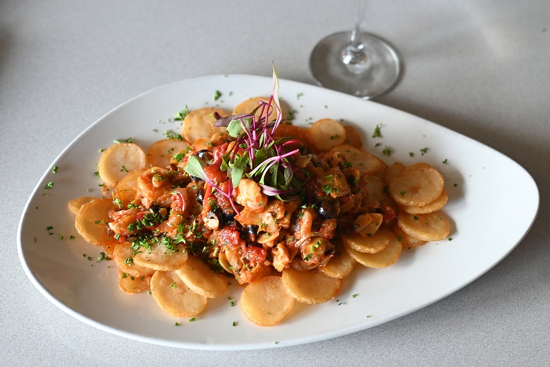 Cod Ribatejano, one of the many ways that the Portuguese prepare salted cod, is the distinctive dish on the menu at Amore. (Photo by Spencer Fordin)