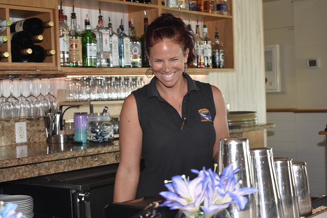 Michelle Rogers is a favorite behind the bar at Dry Dock. She&#39;s worked at the restaurant for 14 years. (Photo by Lesley Dwyer)
