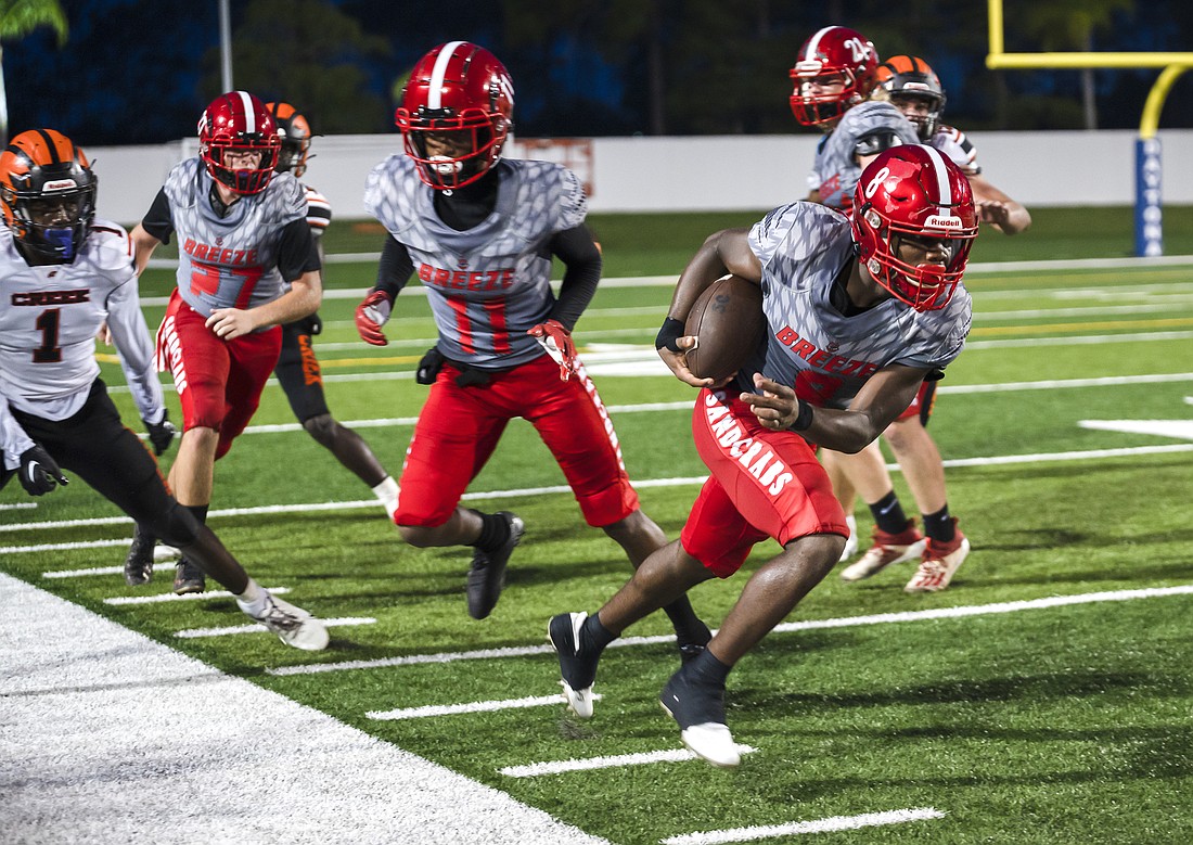 Seabreeze sophomore Denali Campbell (8) runs down the sideline against Spruce Creek. Campbell scored three first-half touchdowns against Satellite on Oct. 7. File photo by Michele Meyers