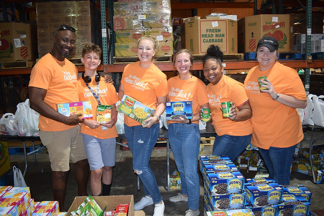 LWRBA volunteers Patrick Larivaud, Cooper Hodgson, Ali Marks, Jenna Nelson, Duette Hart and Annemarie Graff work a shift at Meals on Wheels Plus on Oct. 7, 2022.