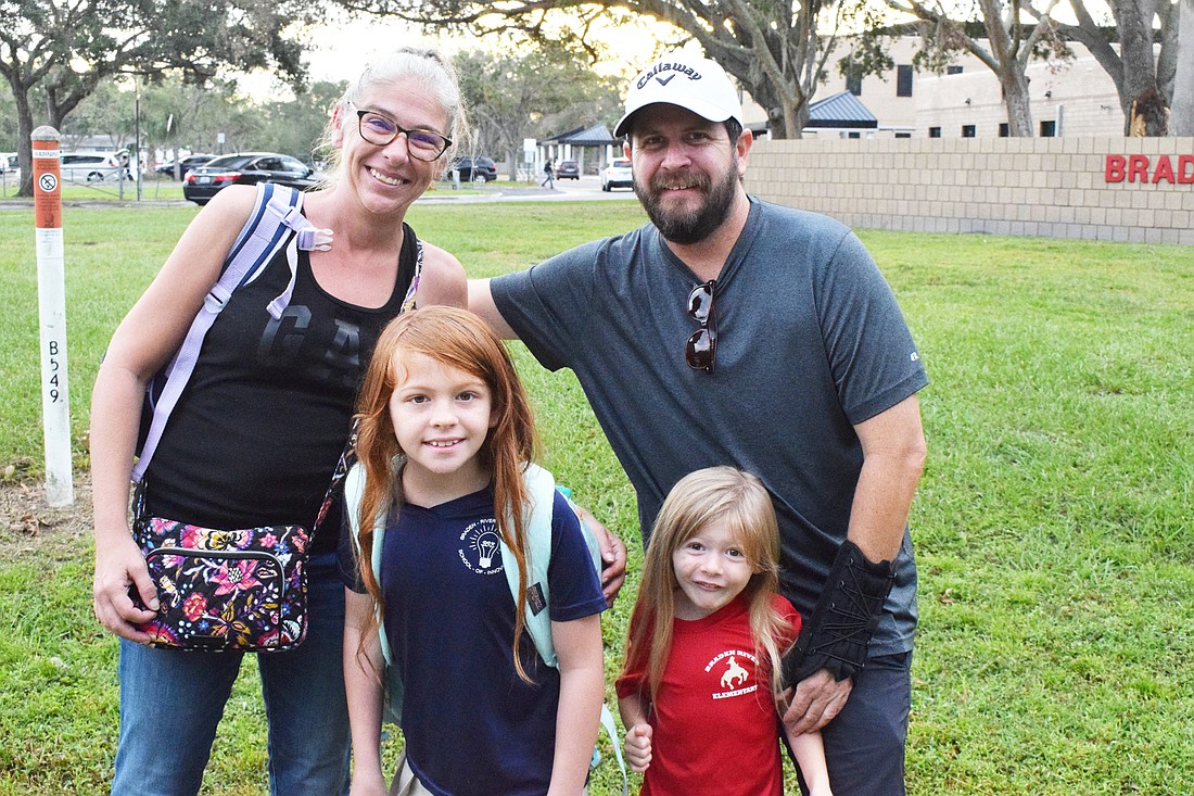 Kristen Patton walks with fourth grader Abigail Patton and Giavanna Patton, who is in pre-K, and Vincent Patton to school. "It&#39;s always good to get the kids out of the house for some morning exercise," Kristen Patton says.