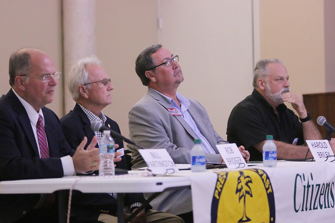 Bill Partington, Rob Bridger, Harold Briley and Brian Nave took part in CFOB's candidate forum on Wednesday, Oct. 12. Photo by Jarleene Almenas