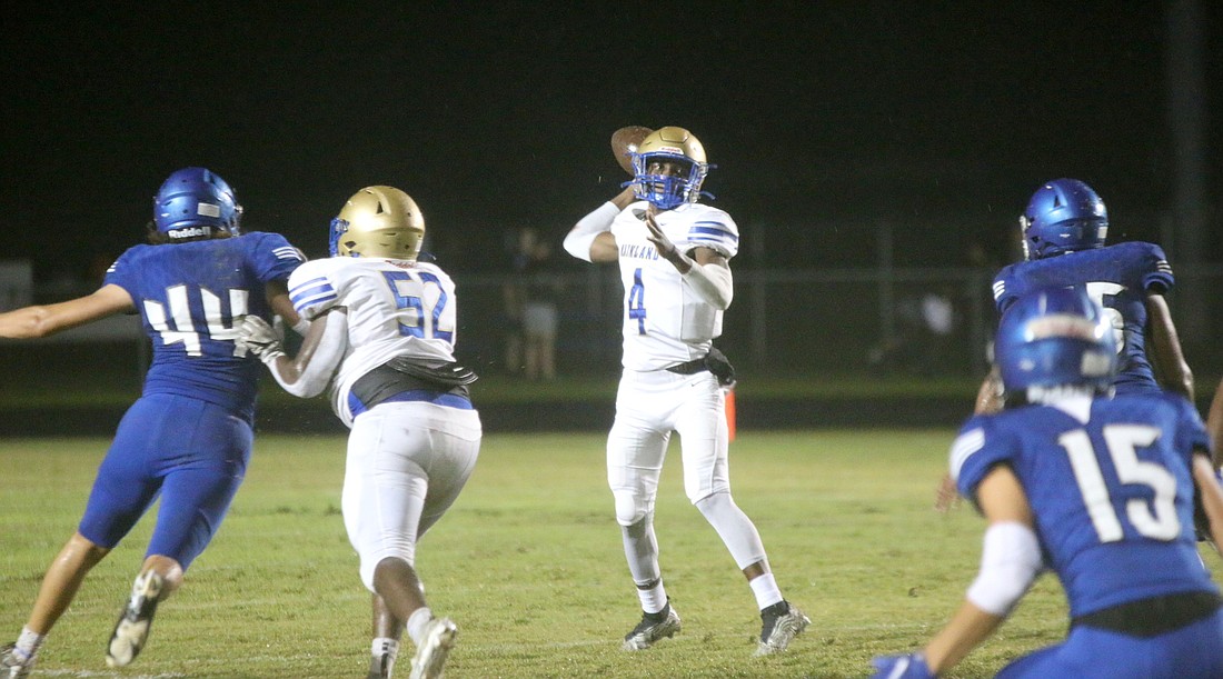 Mainland's Damarcus Creecy threw two first-half touchdown passes against Deltona. File photo
