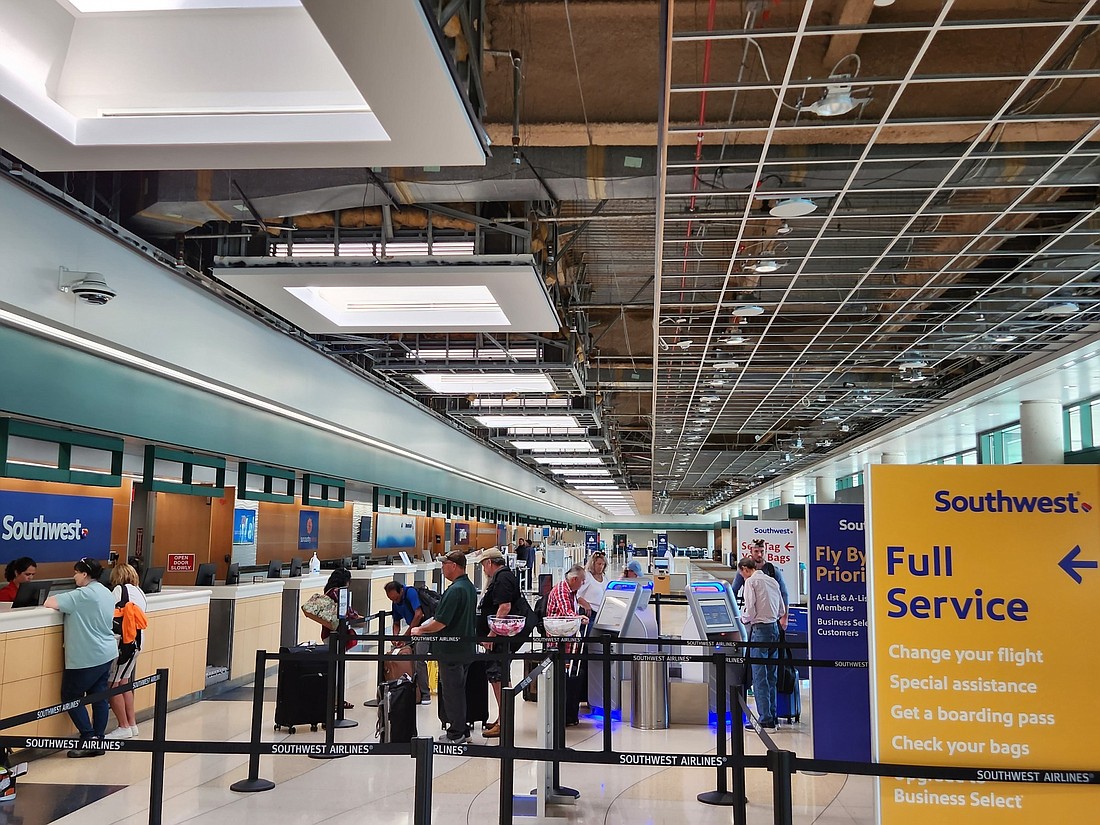 Out of an abundance of caution, all ceiling tiles in the ticketing area at Sarasota-Bradenton International Airport were removed following roof damage caused by Hurricane Ian. (Andrew Warfield)