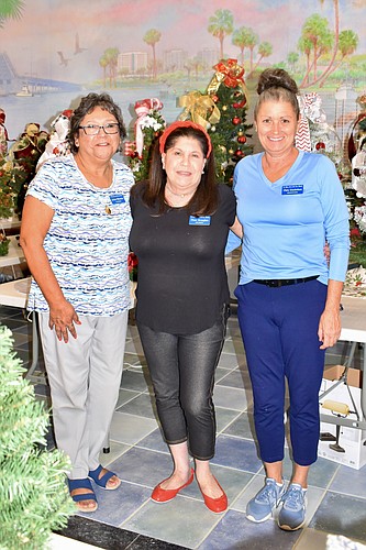 This year&#39;s co-chairs of the annual Christmas Bazaar: JoAnn Sifuentes, Diane Monaghan and Chris Gooderham. (Lesley Dwyer)