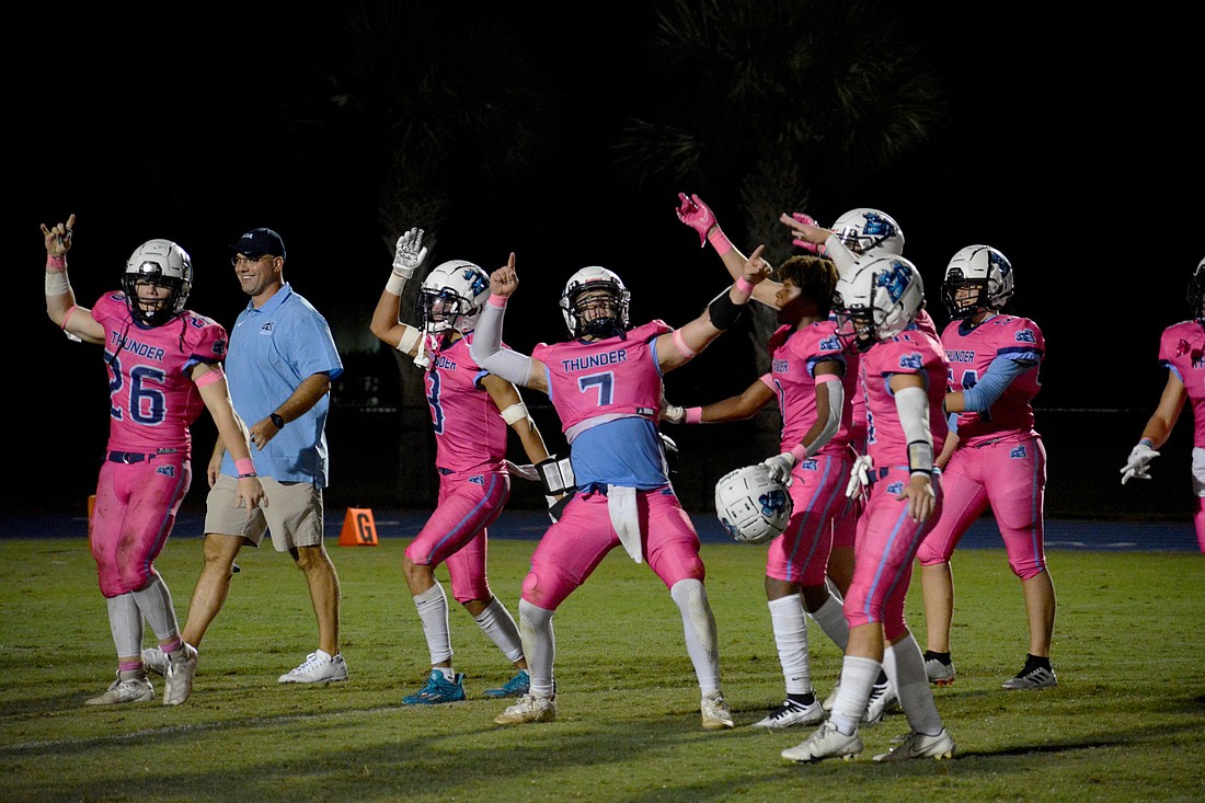 ODA players and first-year Head Coach Rob Hollway celebrate a 54-10 win over Cocoa Beach High on Senior Night. ODA is 8-0 in 2022 after two straight winless regular seasons. (Photo by Ryan Kohn.)