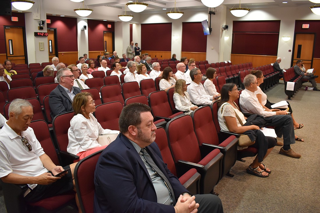 Those opposing development along a section of Lorraine Road in Lakewood Ranch attended Tuesday&#39;s Sarasota County Commission meeting dressed in white shirts to show unity. (Photo by Ian Swaby)