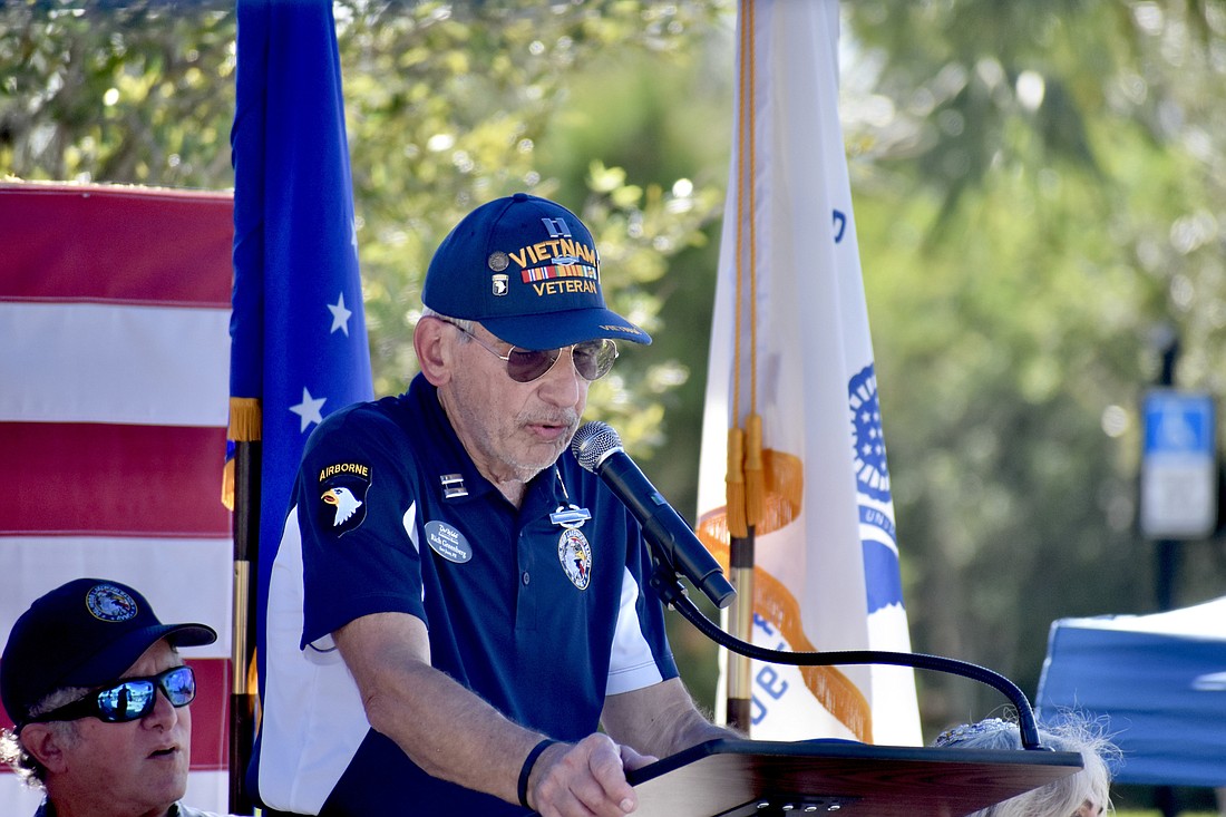 Rich Greenberg, the president of the Del Webb Lakewood Ranch Association of Veterans and Military Supporters, speaks at the event. (Photo by Ian Swaby)