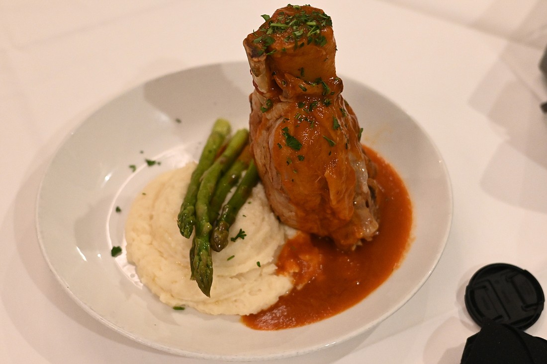 It&#39;s a giant tower of meat served in its own juices, and Grove&#39;s pork osso buco is a meal for all seasons. (Photo by Spencer Fordin)