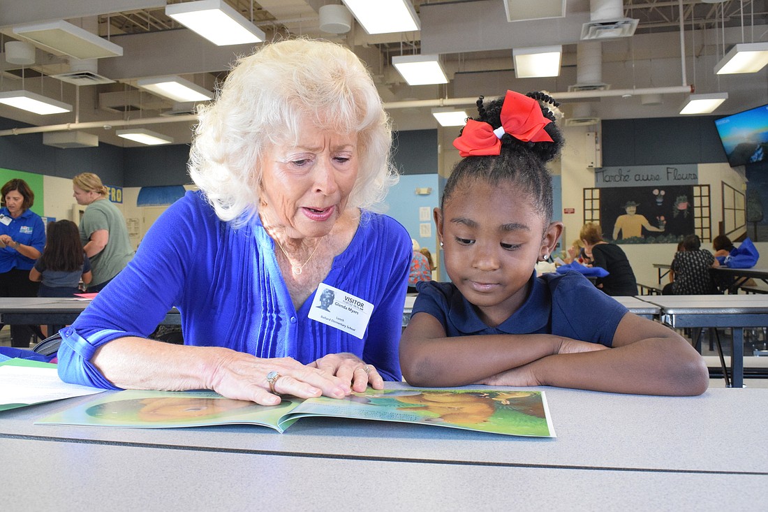 Waterlefe&#39;s Glenda Myers works with Ballard Elementary kindergartner Kemora Wallace once per week. (Photo by Liz Ramos)