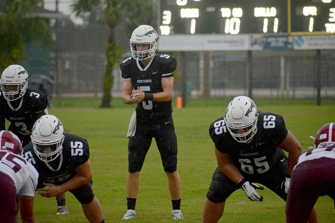 Lakewood Ranch junior Clayton Dees (5) played his first 10 high school football games at quarterback in 2022. Dees said he&#39;s excited to have a grasp of the Mustangs&#39; scheme going into 2023. (File photo)