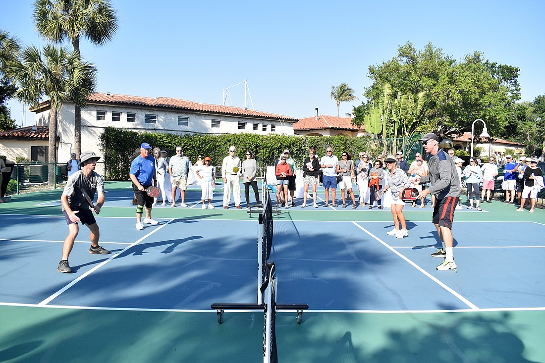 Club members play pickleball following the opening of the club&#39;s first courts. (File photo)