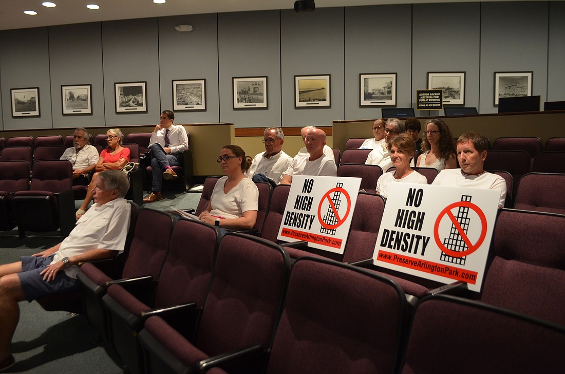 Residents brought "No High Density" signs to the meeting.