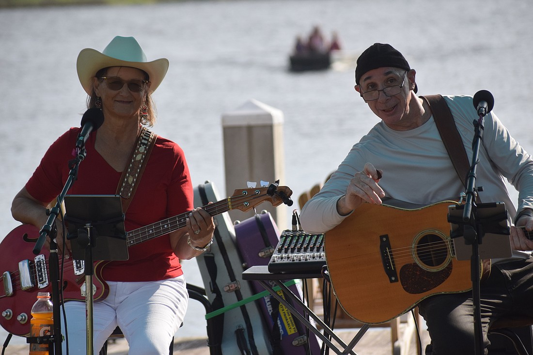 Hal Meyers and Cindie Breeze of the Bluegrass Pirates entertain the crowd at Jiggs Landing. (Photo by Jay Heater)
