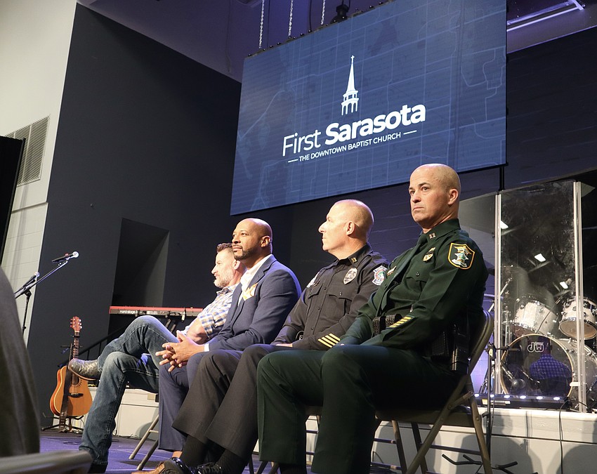 Congressman Greg Steube, Mayor Kyle Scott Battie, Sarasota Police Captain Robert Armstrong and Sarasota Police Captain Bryan Ivings take stage to welcome the special guests.