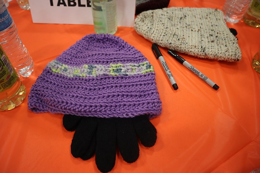 Handmade crochet hats by Ginny Hoenig for the special guests.