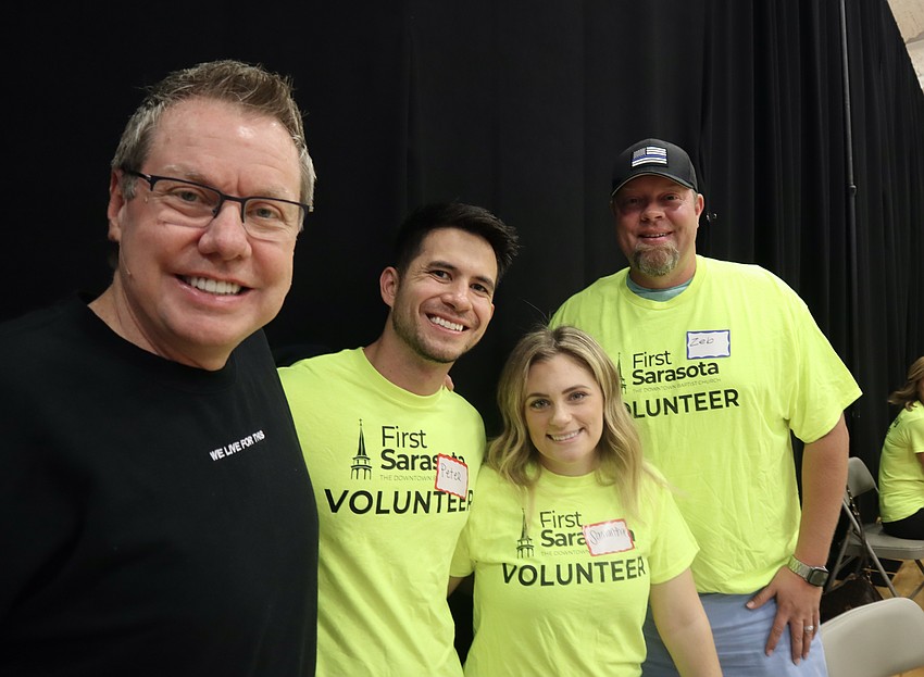 Dr. John Cross, Peter Brown, Samantha Brown, Zeb Land gather together and wait to welcome the special guests.