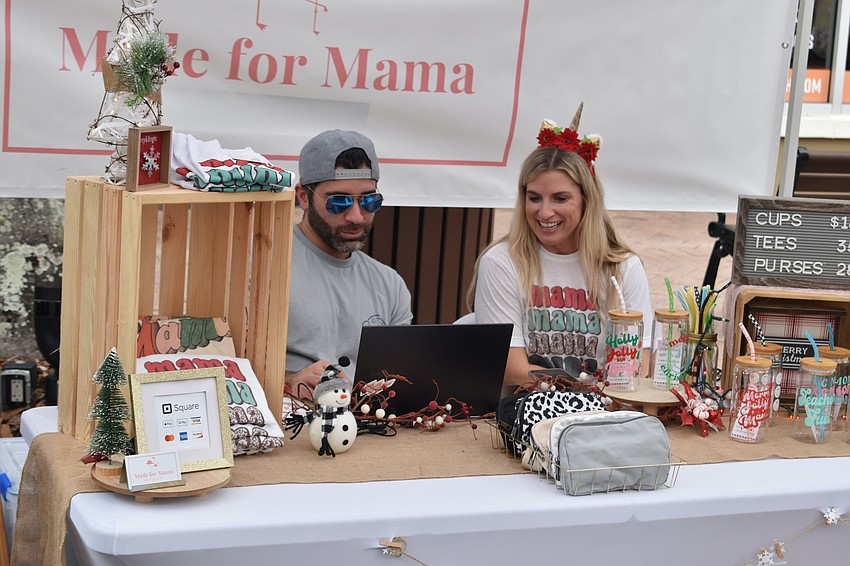 Bradenton's Anthony and Brandy Guarnera of Made for Mama await customers at their stand.