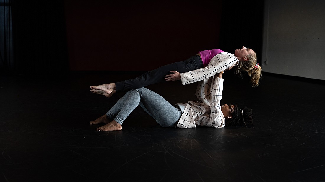 Monessa Salley lifts Jessica Obiedzinski as part of a duet in the upcoming Sarasota Contemporary Dance collaboration with enSRQ.