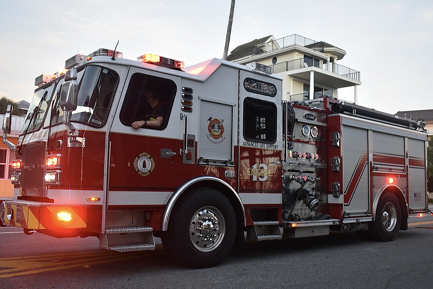 Bryan Rood clears Ocean Boulevard for the start of the parade.