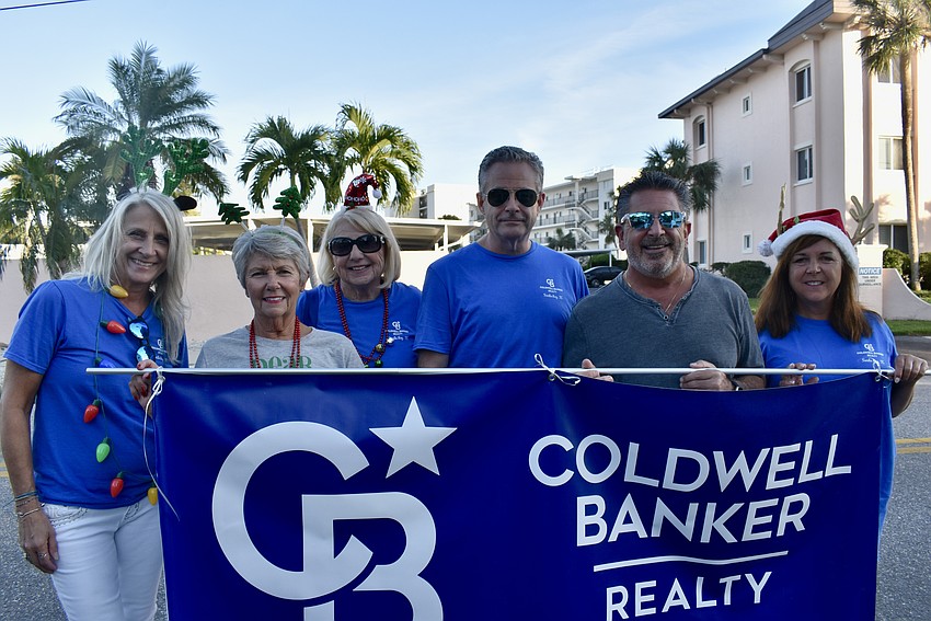 Cj Paulus, Tina Haddad, Linda Ren, Harry Knight, Stephen Clementi and Laura Rodriguez walks with Coldwell Banker.