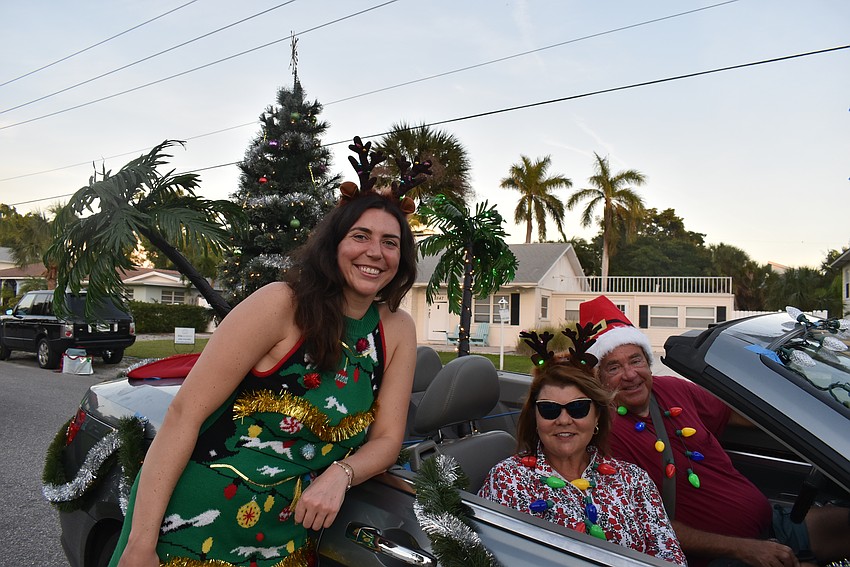 Bailey, Becky and Henry Seiner waits for the parade to start.